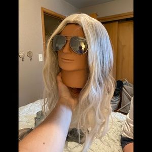 Long blond wavy synthetic wig with full lace cap